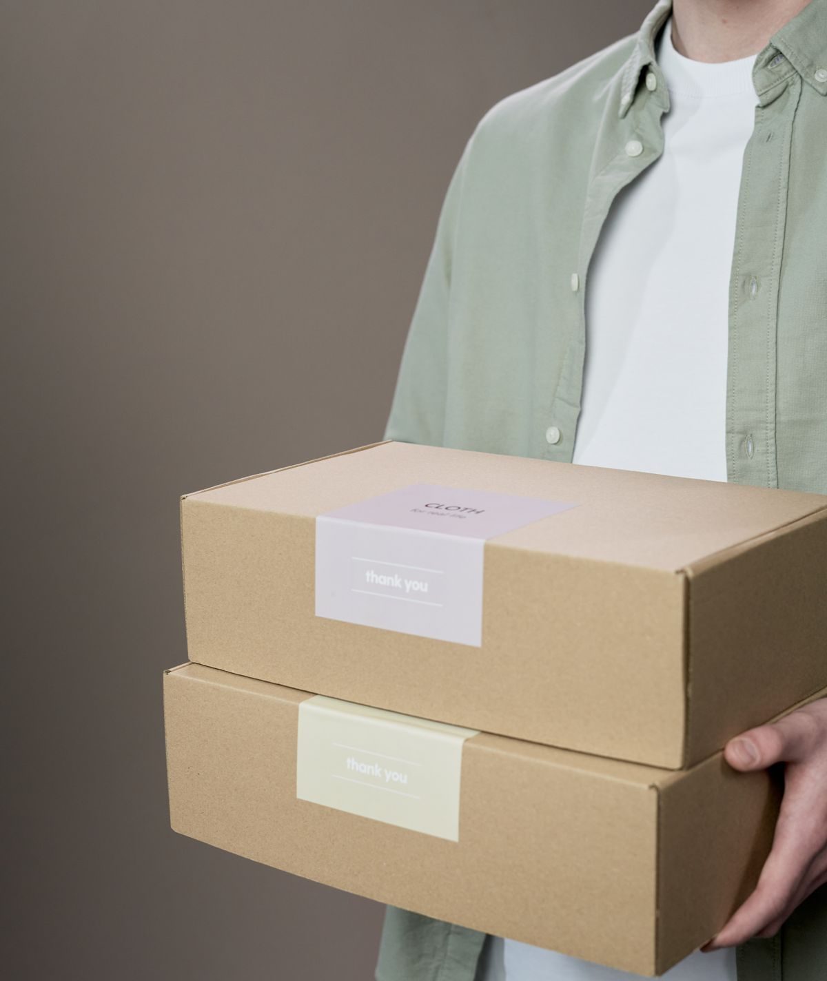 Courier handing over two parcels