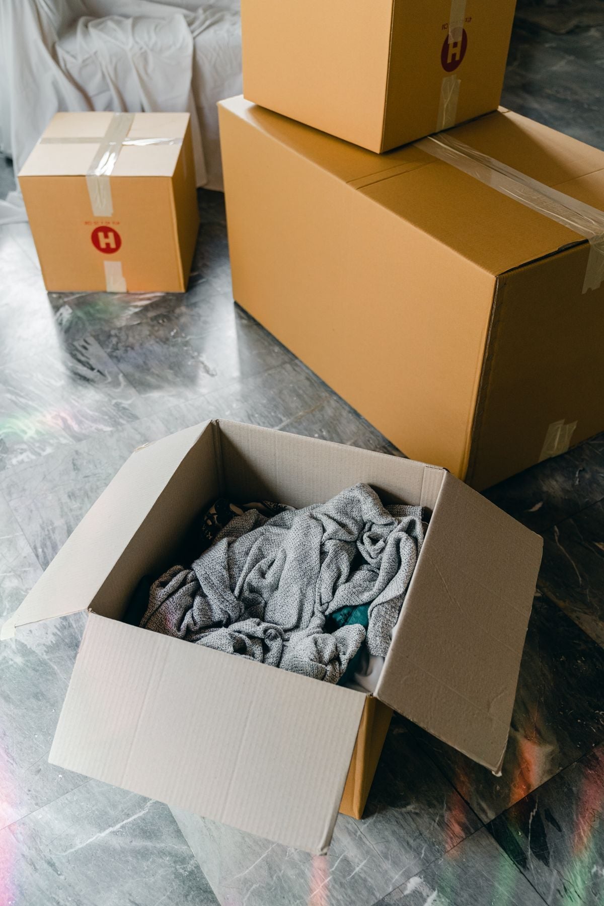 An opened box of delivered apparel