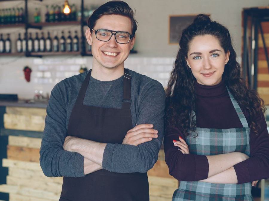 Wholesale business owners in their store