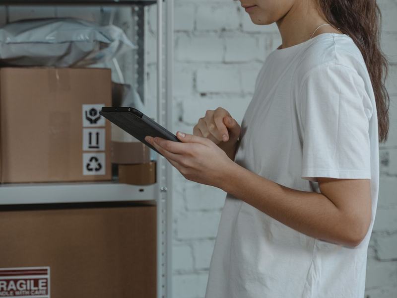 Supplier checking inventory on a tablet