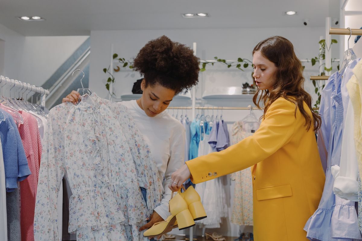 Reseller checking her closet on a phone