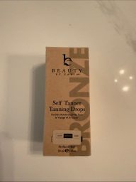 Fenty Beauty Diamond Bomb All-Over Face & Body Highlighter - Gold Shi…